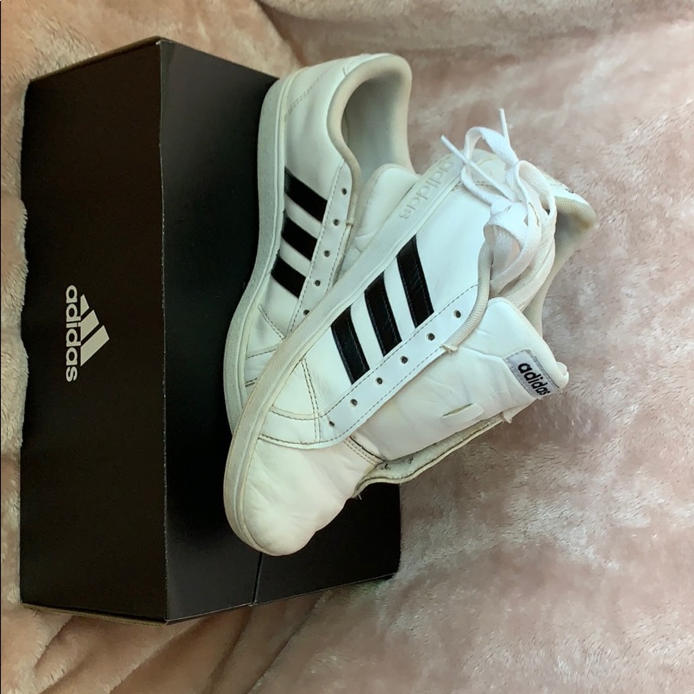 Black and white Adidas shoes